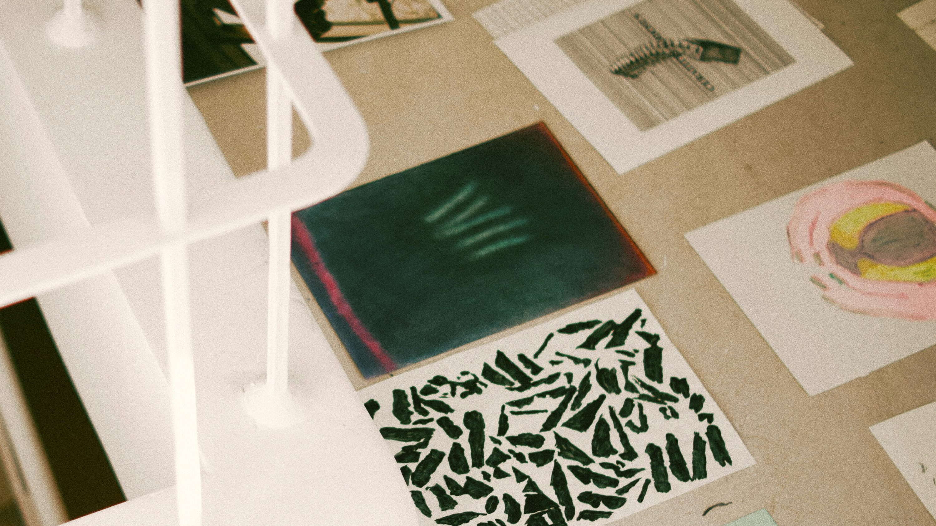 Art prints on table